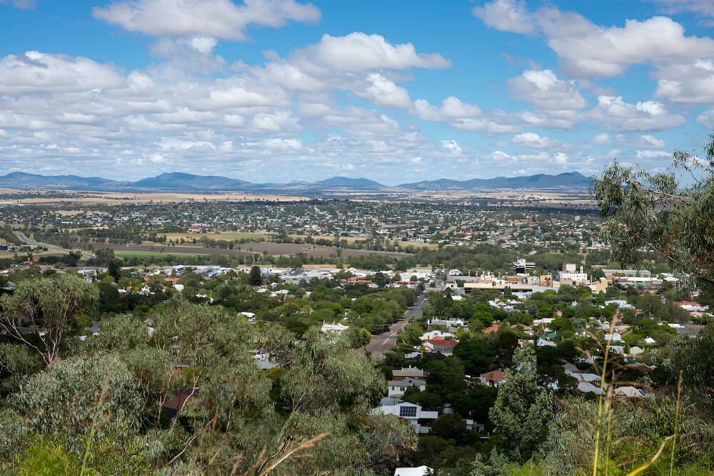 A View Of A City From A Hill With Mountains — Lohman Contracting in Tamworth, NSW