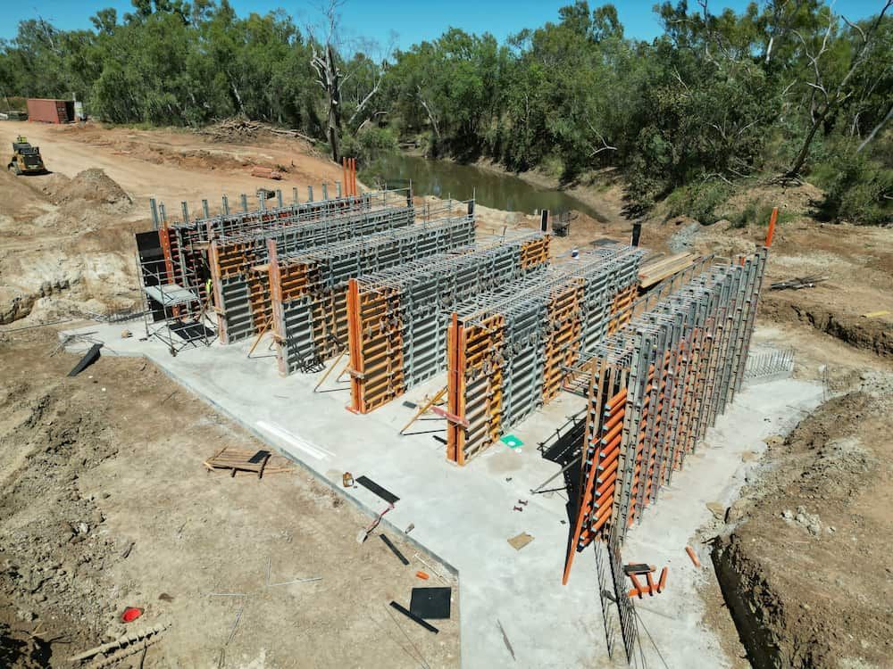 An Aerial View Of A Construction Site With A River — Lohman Contracting in Charters Towers, QLD