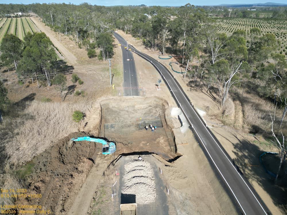 An Aerial View Of A Road With Trees On Both Sides — Lohman Contracting in Emerald, QLD