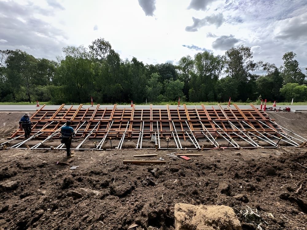 A Large Concrete Structure Is Being Built In The Middle Of A Dirt Field — Lohman Contracting in Emerald, QLD