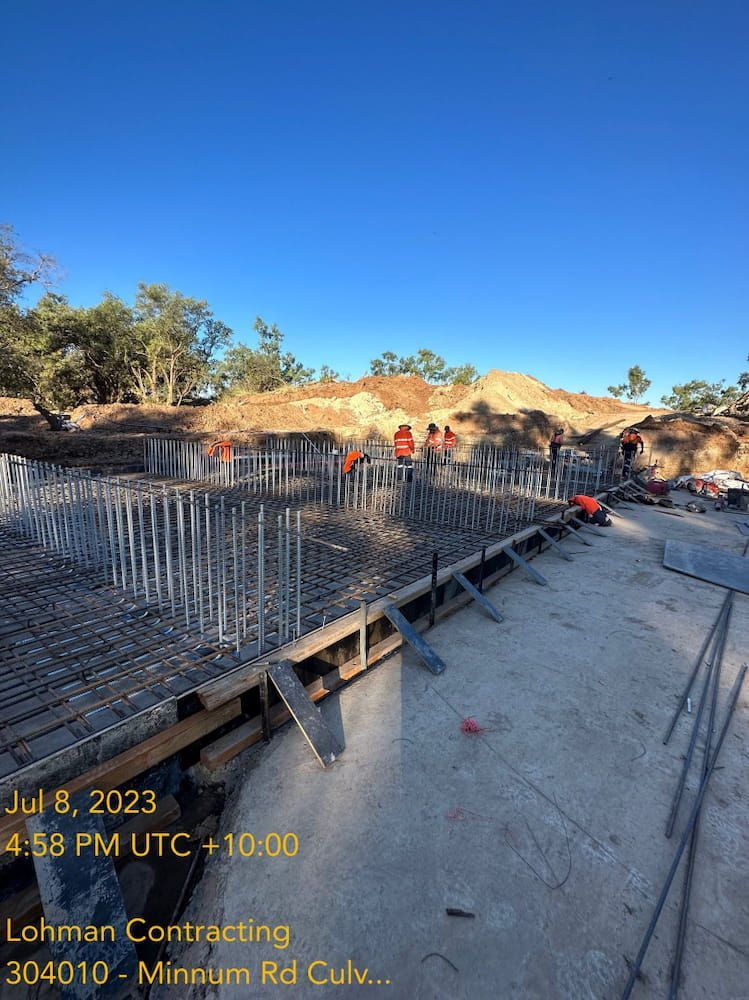 A Group Of People Are Working On A Construction Site — Lohman Contracting in Tamworth, NSW