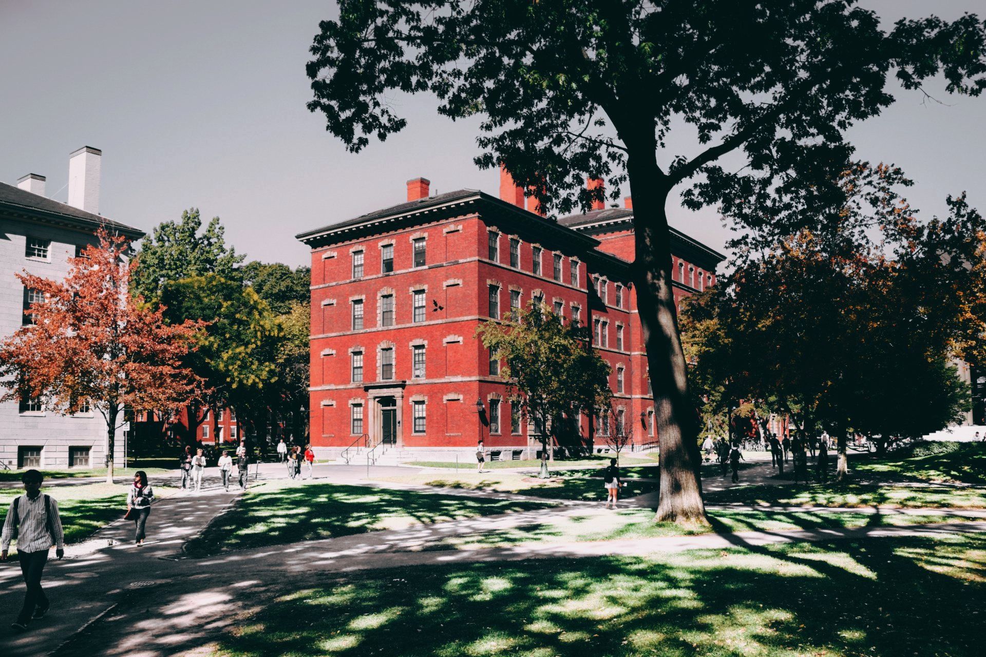 a large red brick building with a tower on top