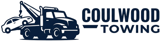 Dark blue logo for Coulwood Towing featuring a tow truck pulling a car.