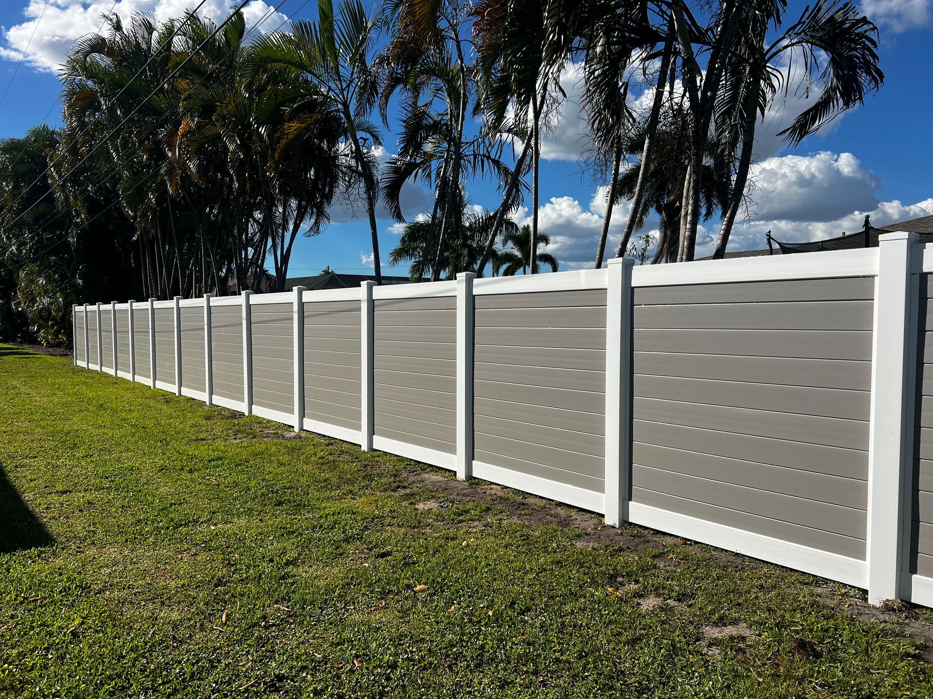 White Fence in front of the House — Cape Coral, FL — Global Fence Inc.