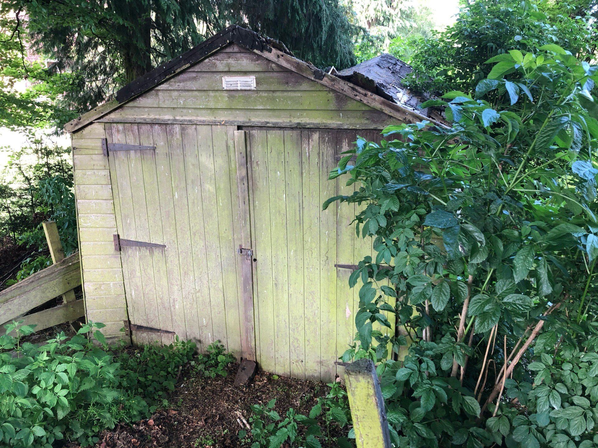 old shed before removal and disposal
