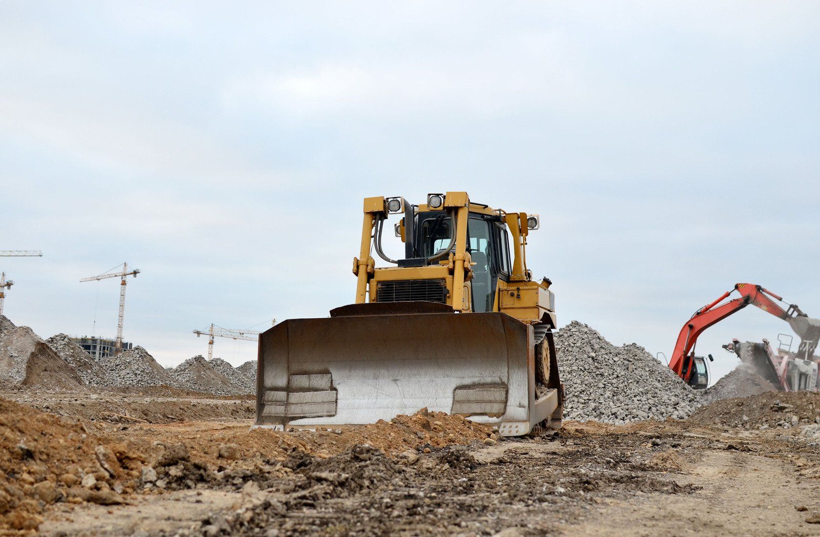 Land being graded by bulldozer