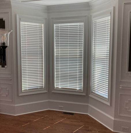 Custom window installation A room with a lot of windows and blinds