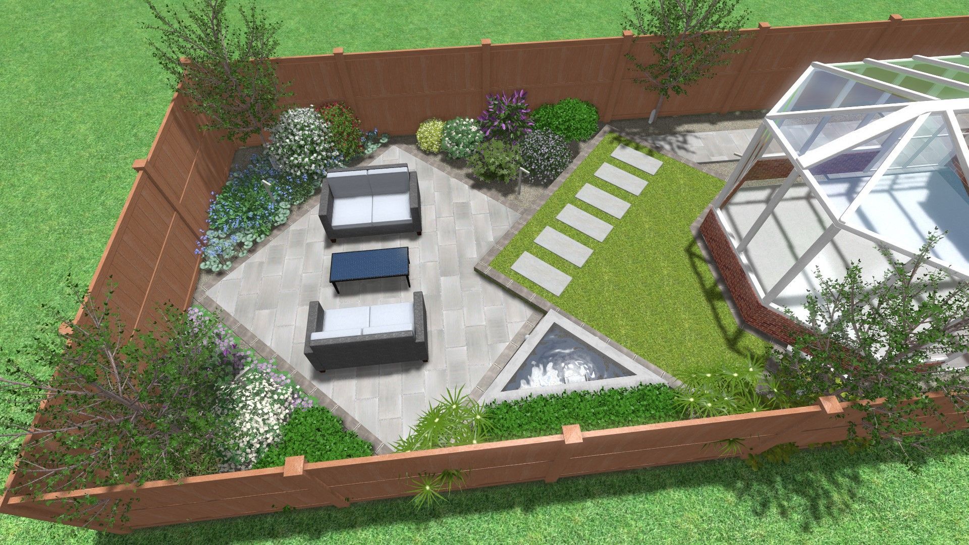 Backyard patio with lounge chairs, potted plants, artificial grass, and a glass conservatory