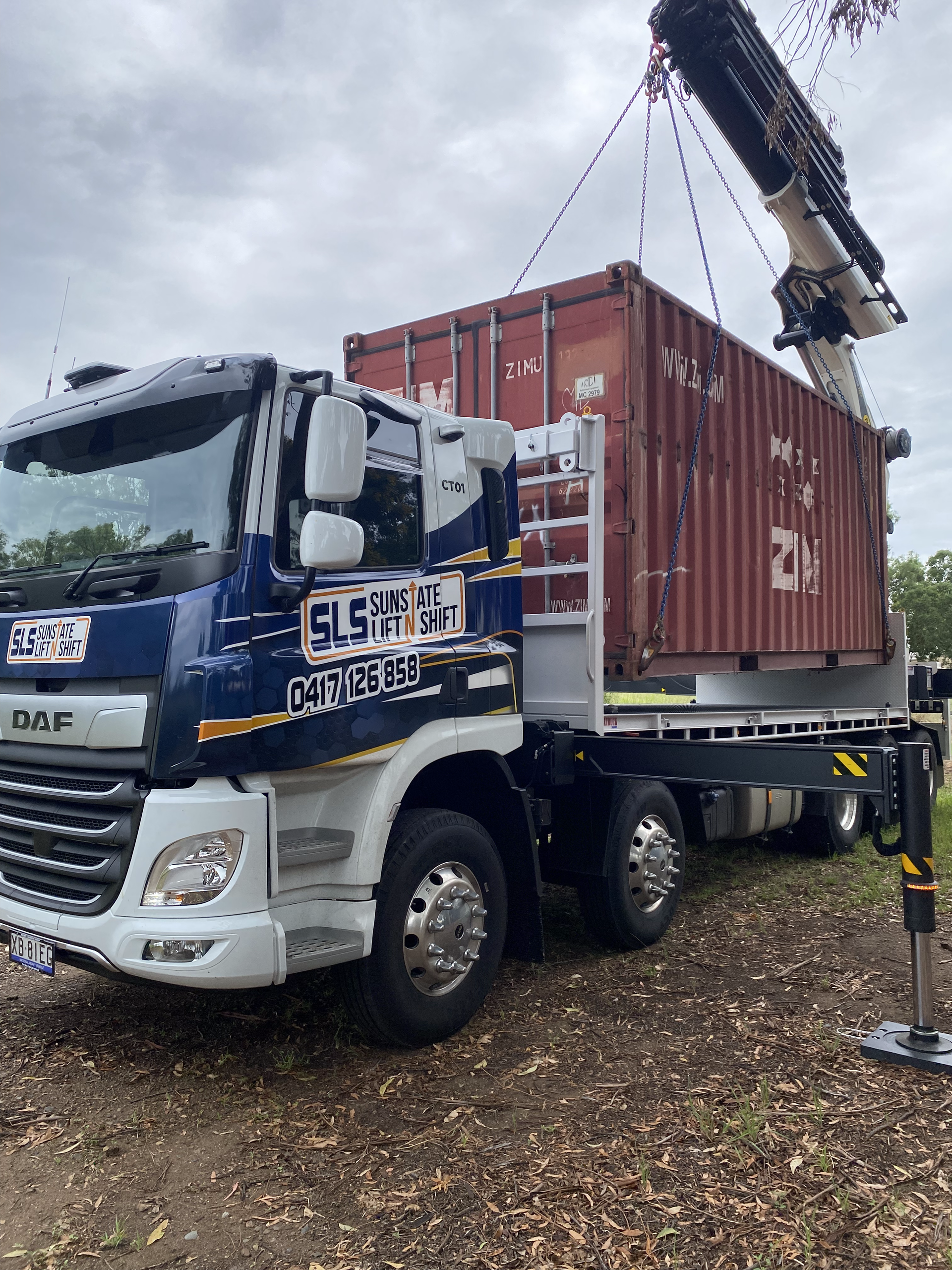 Crane Works And Container Loading On The Truck — Supply Lifting Equipment in Cooroibah, QLD
