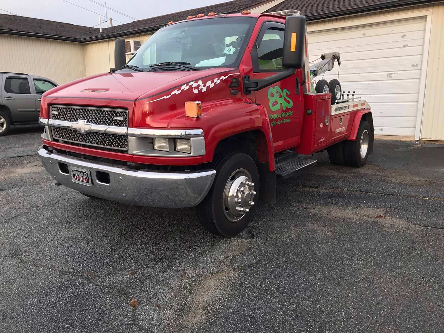 Red Towing Truck — Thomasville, NC — Overtime Custom Interiors