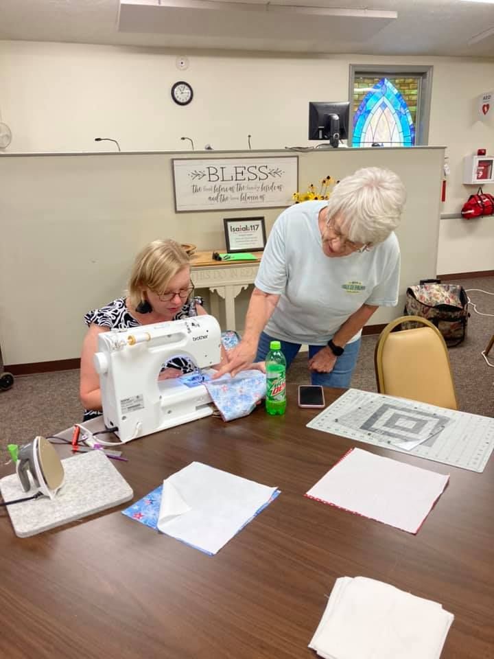 Image of 2 women quilting