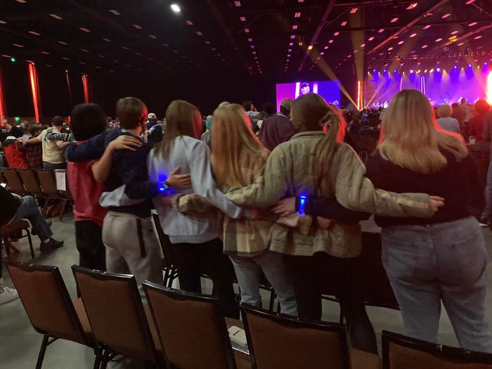 image of young people at a concert