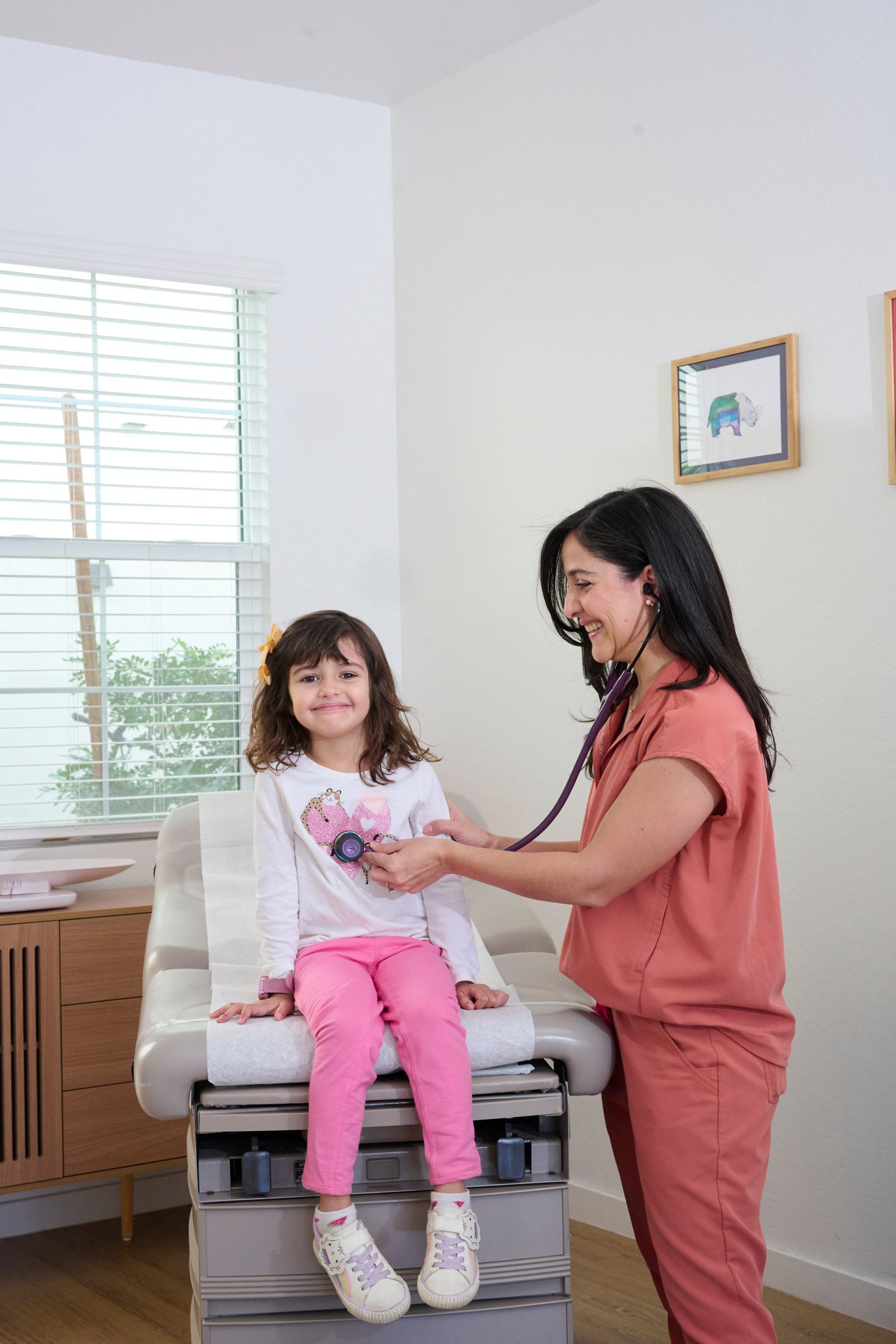 Board-certified family doctor Sarah Bahsas providing personalized medical care in Tempe.