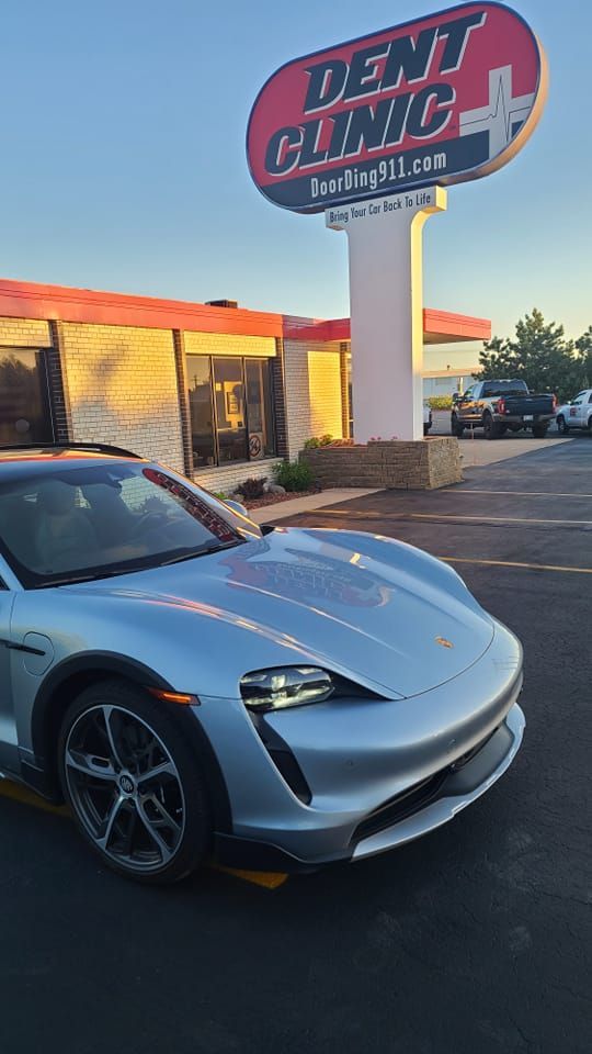 Porsche in front of Dent Clinic auto repair in Brookfield, WI