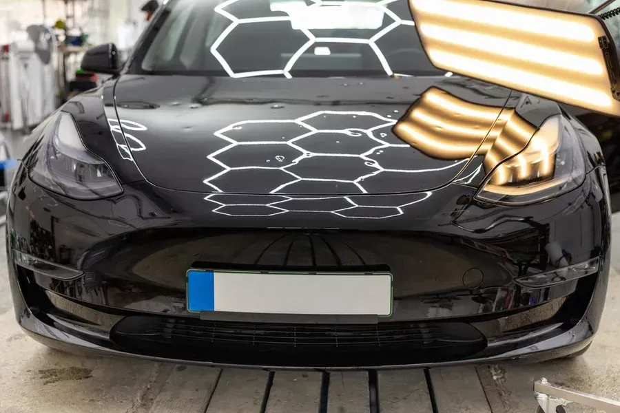 A Dent Clinic client’s car is undergoing a hail damage inspection.