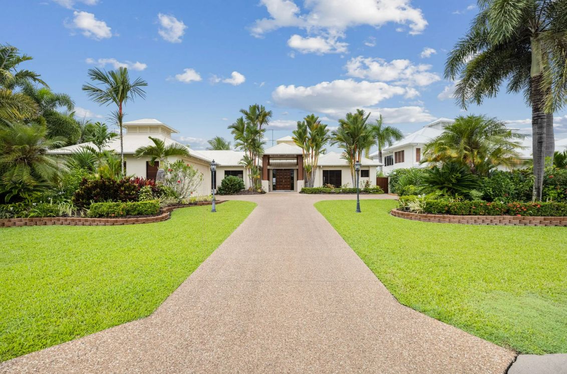 Stone Driveway Leading to a White Mansion — MDSR Group In Manunda, QLD