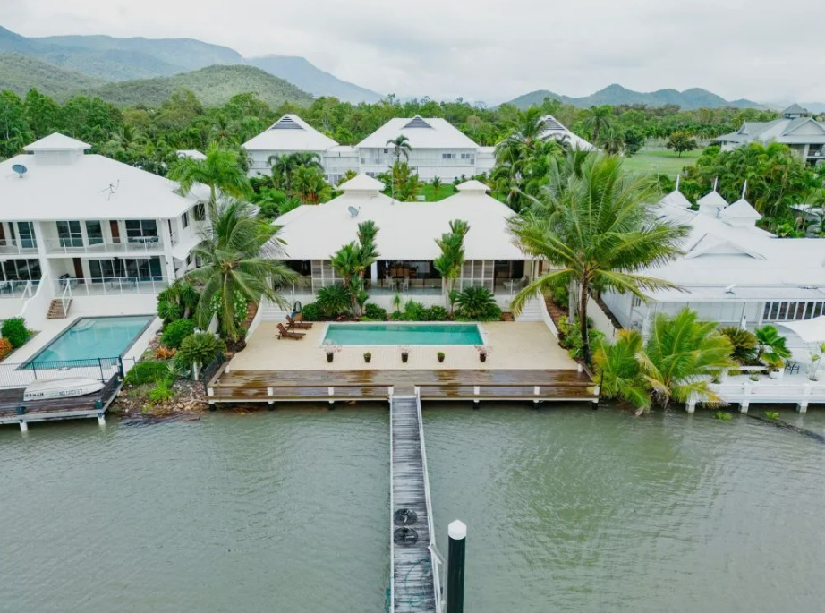 Luxury Waterfront Home With Pool and Dock — MDSR Group In Manunda, QLD