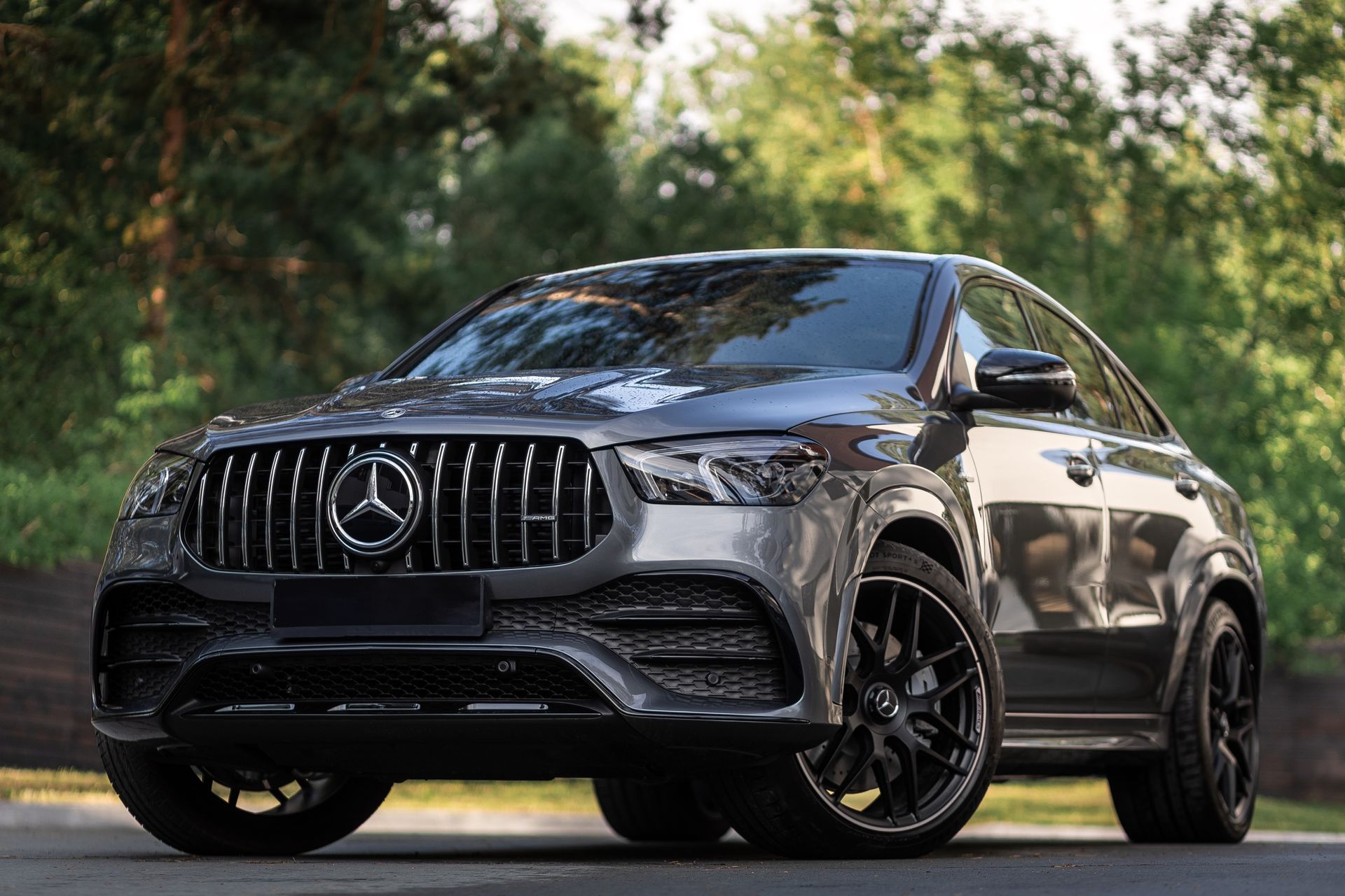 A mercedes benz gle 43 amg is parked on the side of the road.