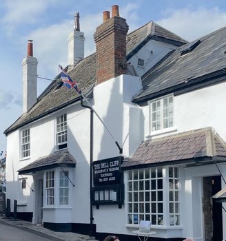 Exterior painting of a period property on Broad Street in Lyme Regis, Dorset