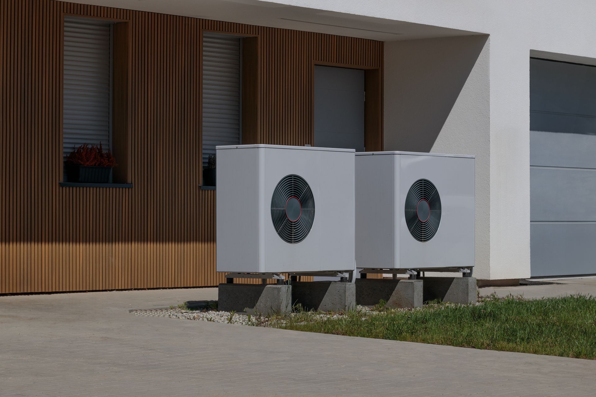 Modern air-source heat pump installed outside a Lower Mainland home in British Columbia.