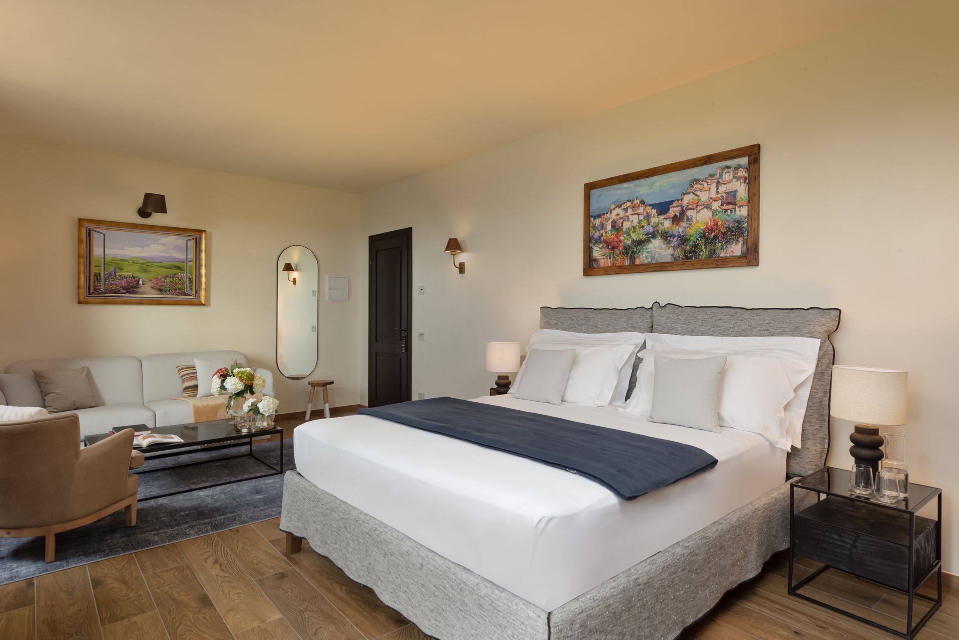 There is a large bed in the middle of the room.