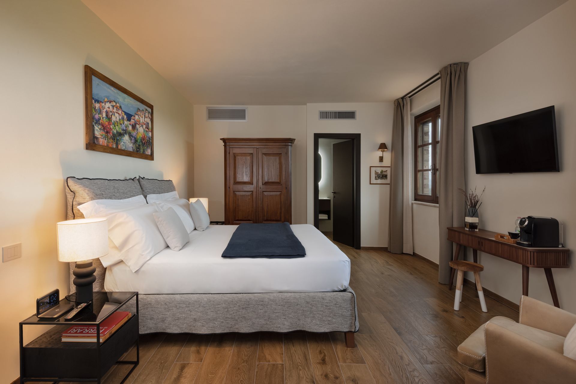 There is a large bed in the middle of the room.