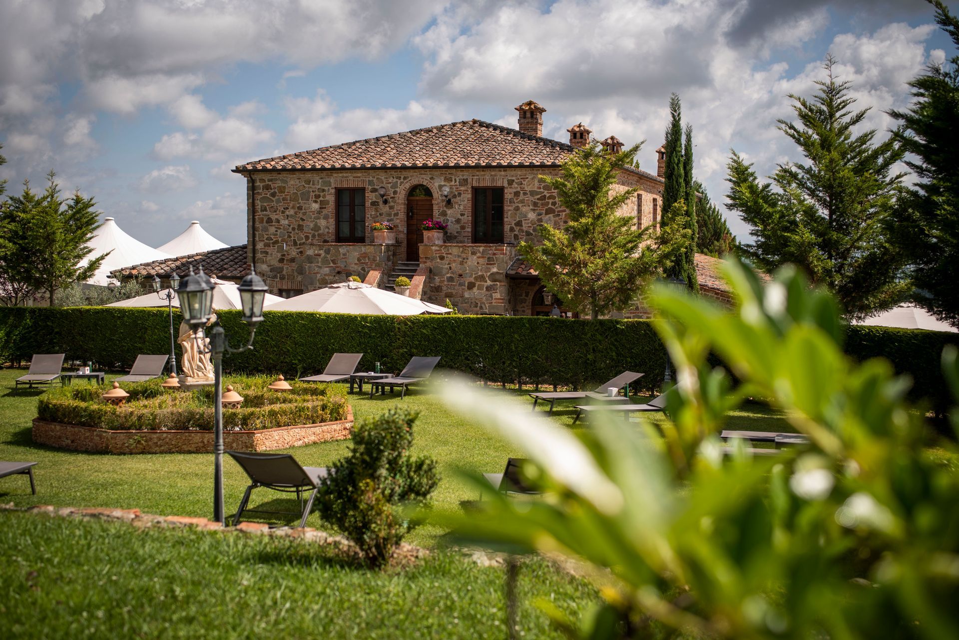 A view of Poggio Paradiso from the
Tuscan gardens.