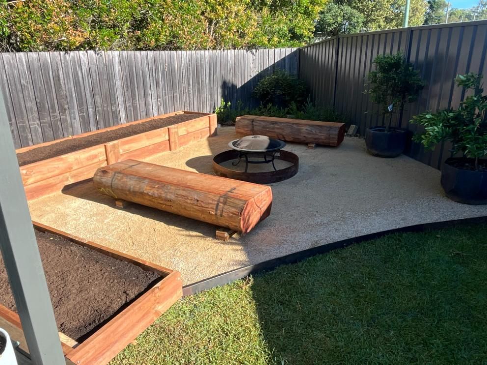 There Is A Fire Pit In The Middle Of The Backyard — Lewis Landscapes In Yippin Creek, NSW