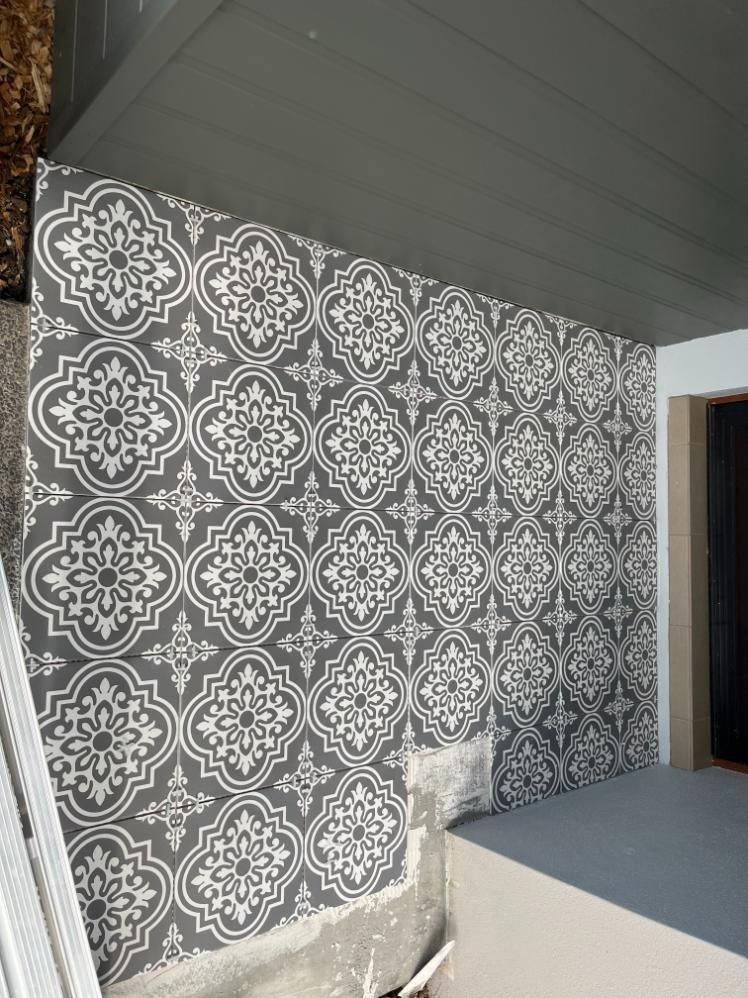 A Room With A Gray Wall With A White Pattern On It — Lewis Landscapes In Yippin Creek, NSW