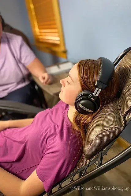 Female Sleeping While Using Headphone — Knoxville, IA — Holistic Health & Wellness Center
