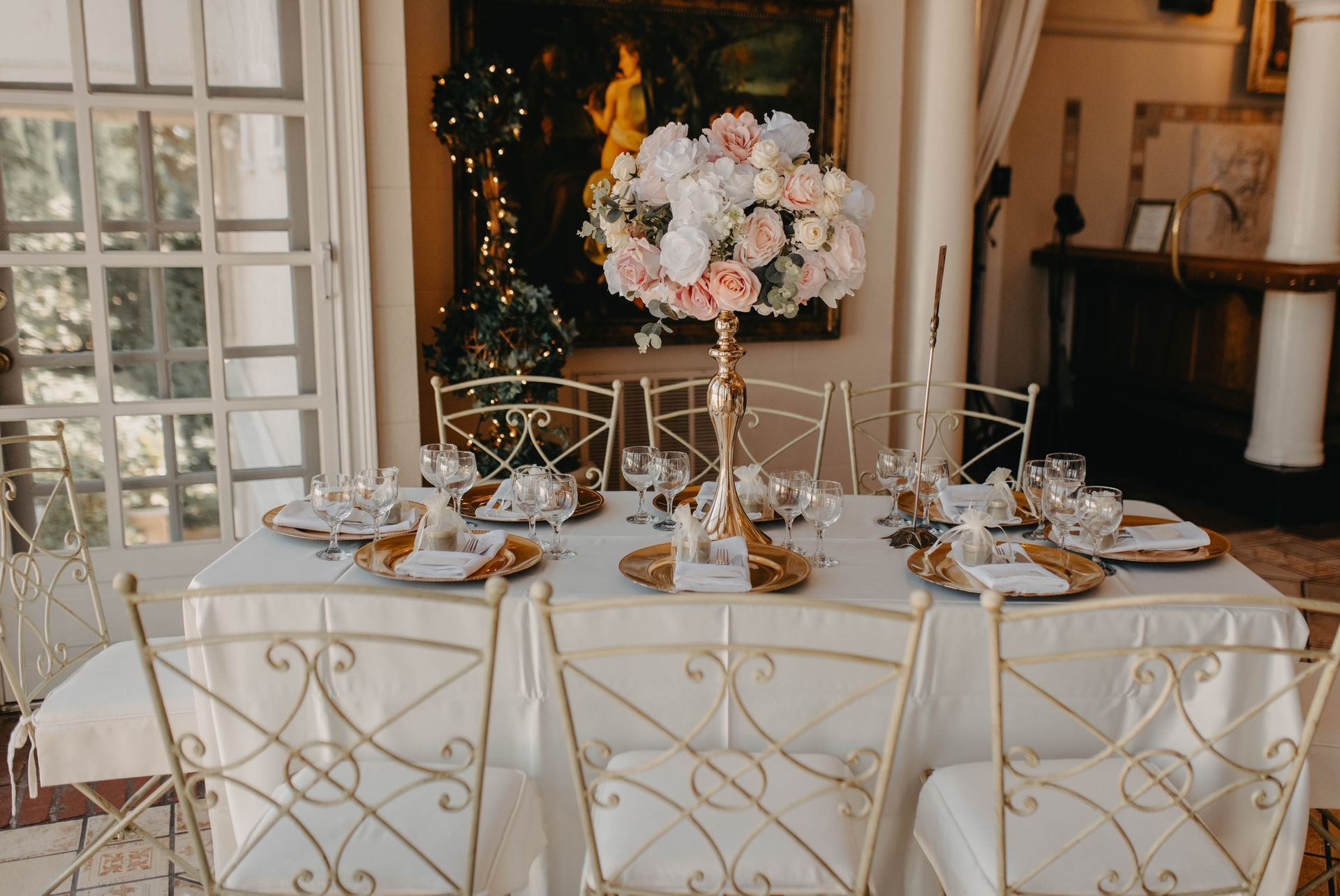 a table with a vase of flowers on it