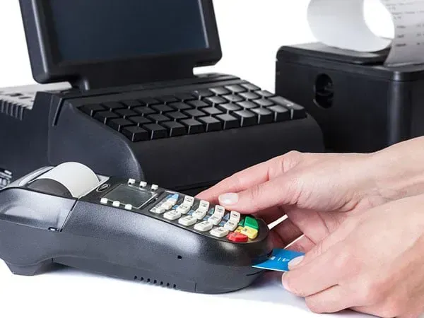 Man Paying With Credit Card — Wilmington, NC — GSO Enterprises LLC