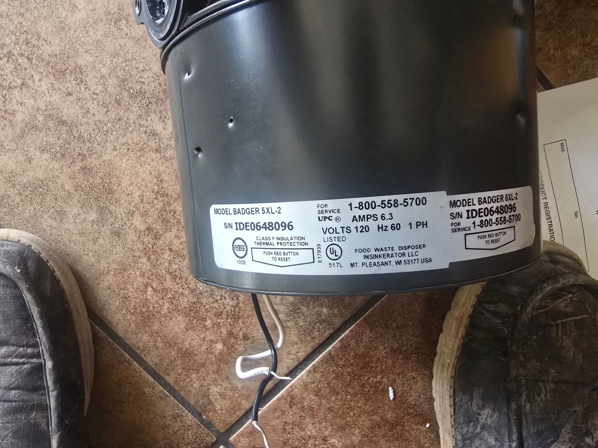 Replacement appliance parts on a workbench