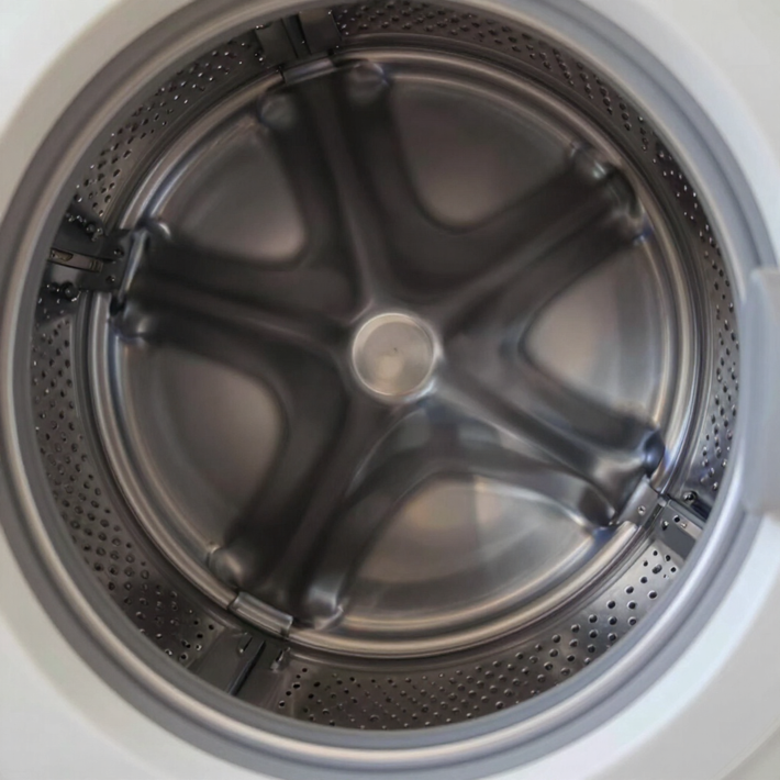 Close-up diagnostic inspection of a home appliance component.