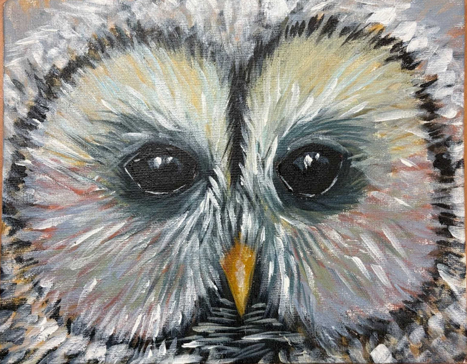 Close-up painting of an owl's face, with dark eyes, yellow beak, and white and gray feathers.
