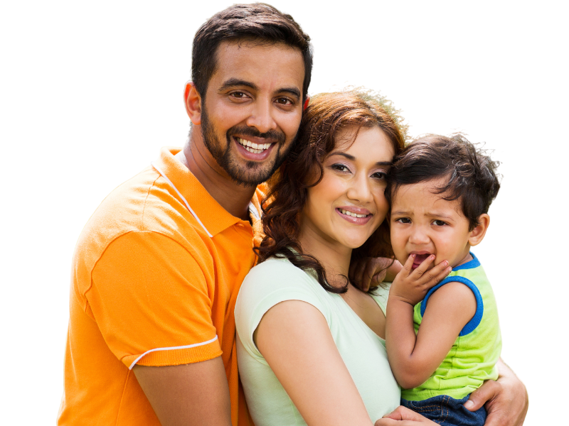A man , woman and child are posing for a picture.