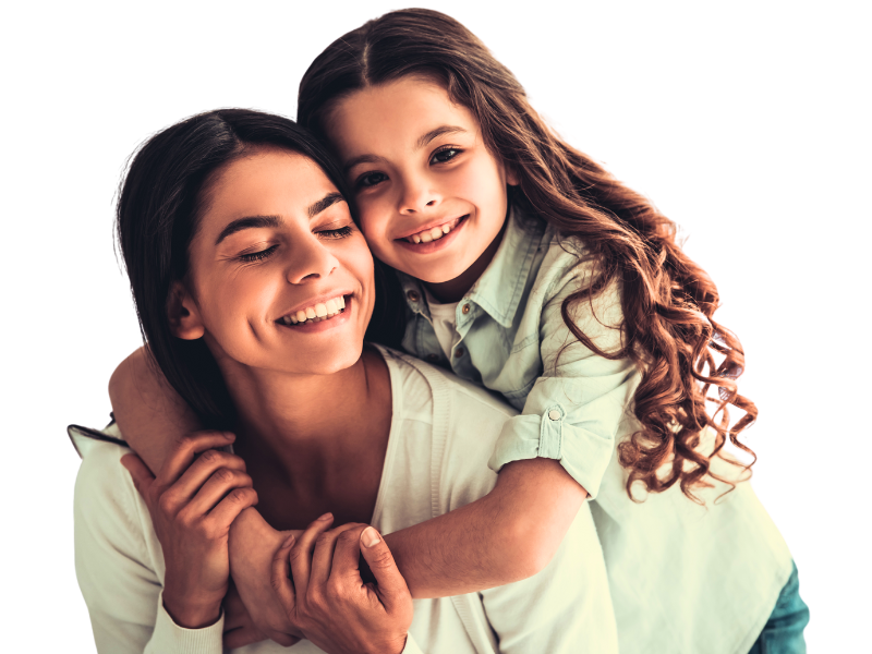A woman is carrying a little girl on her back.