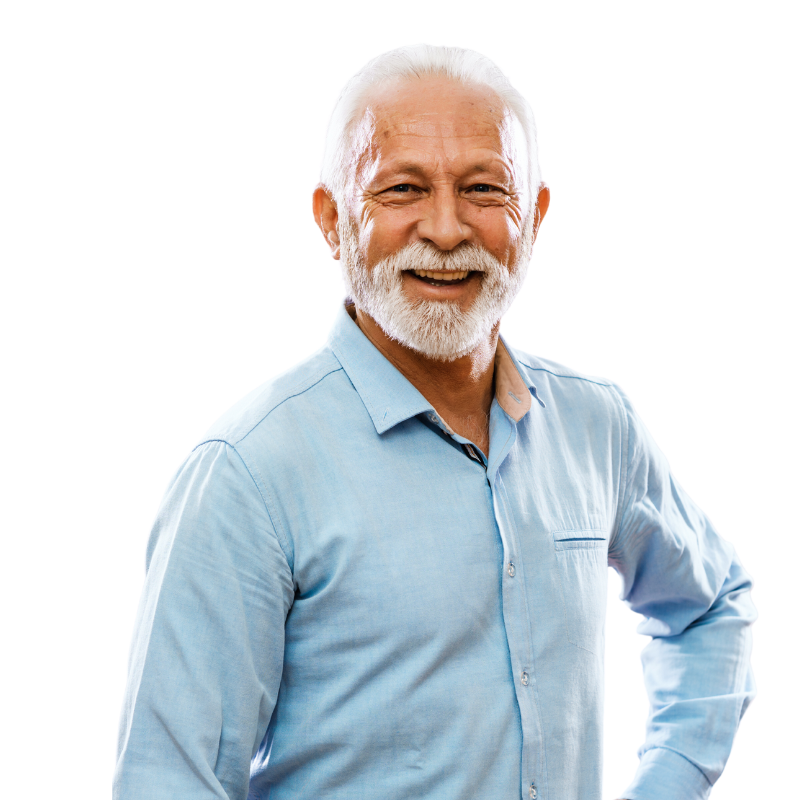 A man with a beard is wearing a blue shirt and smiling.