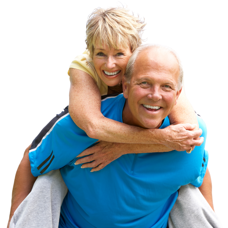 A man in a blue shirt is carrying a woman on his back