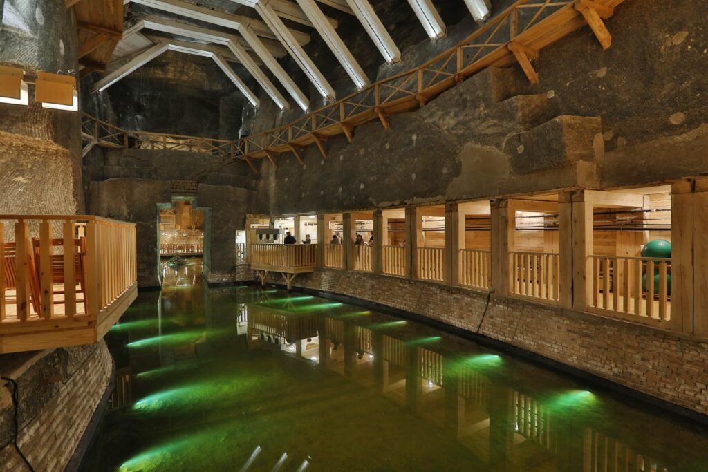 Guided tour group inside Wieliczka Salt Mine tunnels from Krakow