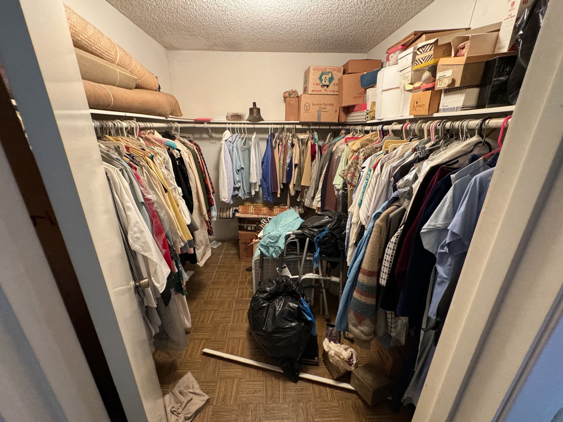 Cluttered closet before a hoarder cleanout in San Pedro