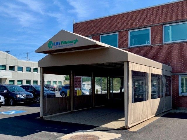 A covered entrance with the 