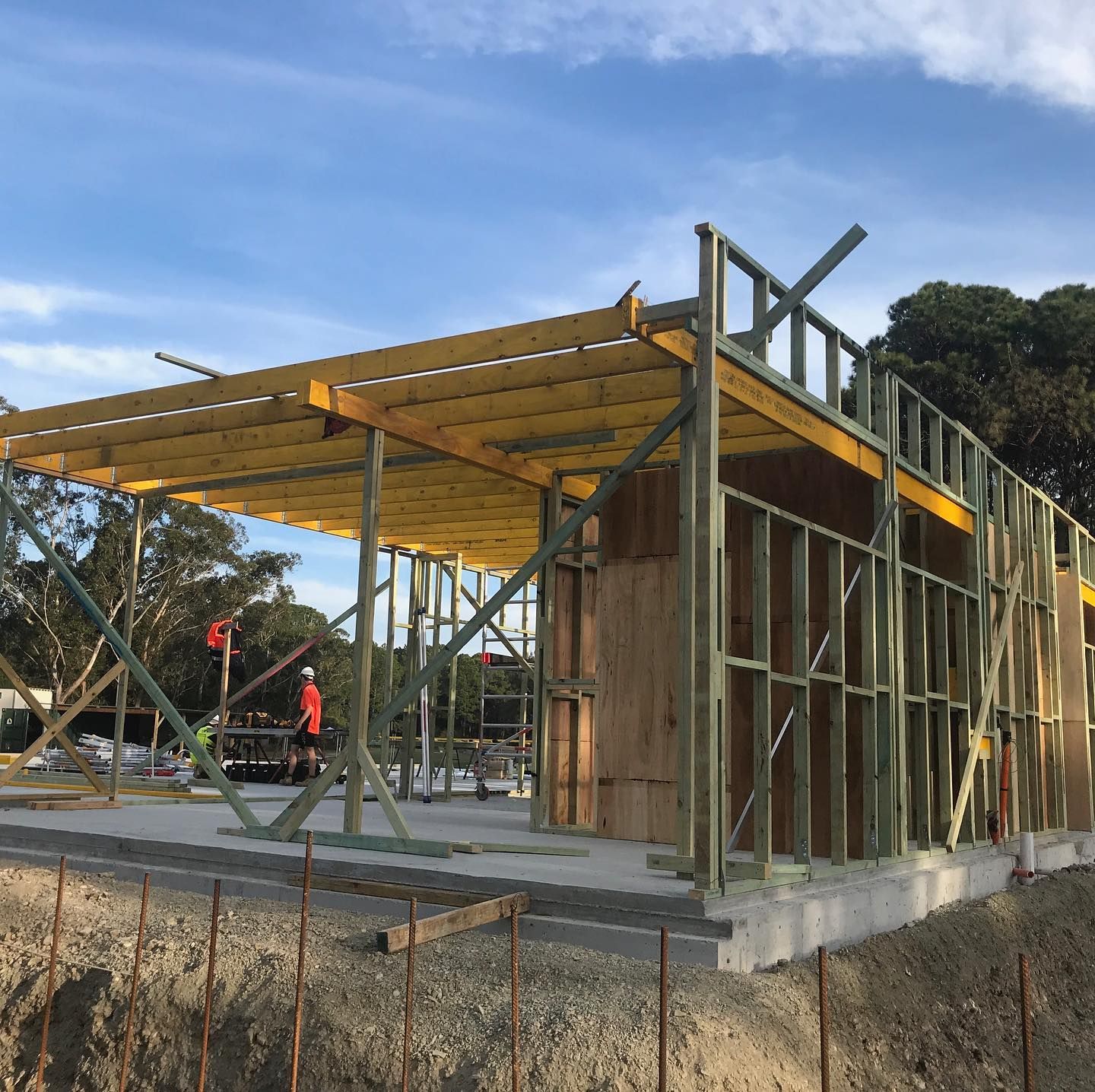 A Construction Site with Wooden Frame Building Under Construction — Coastline Building & Renovations In Smiths Lake, NSW