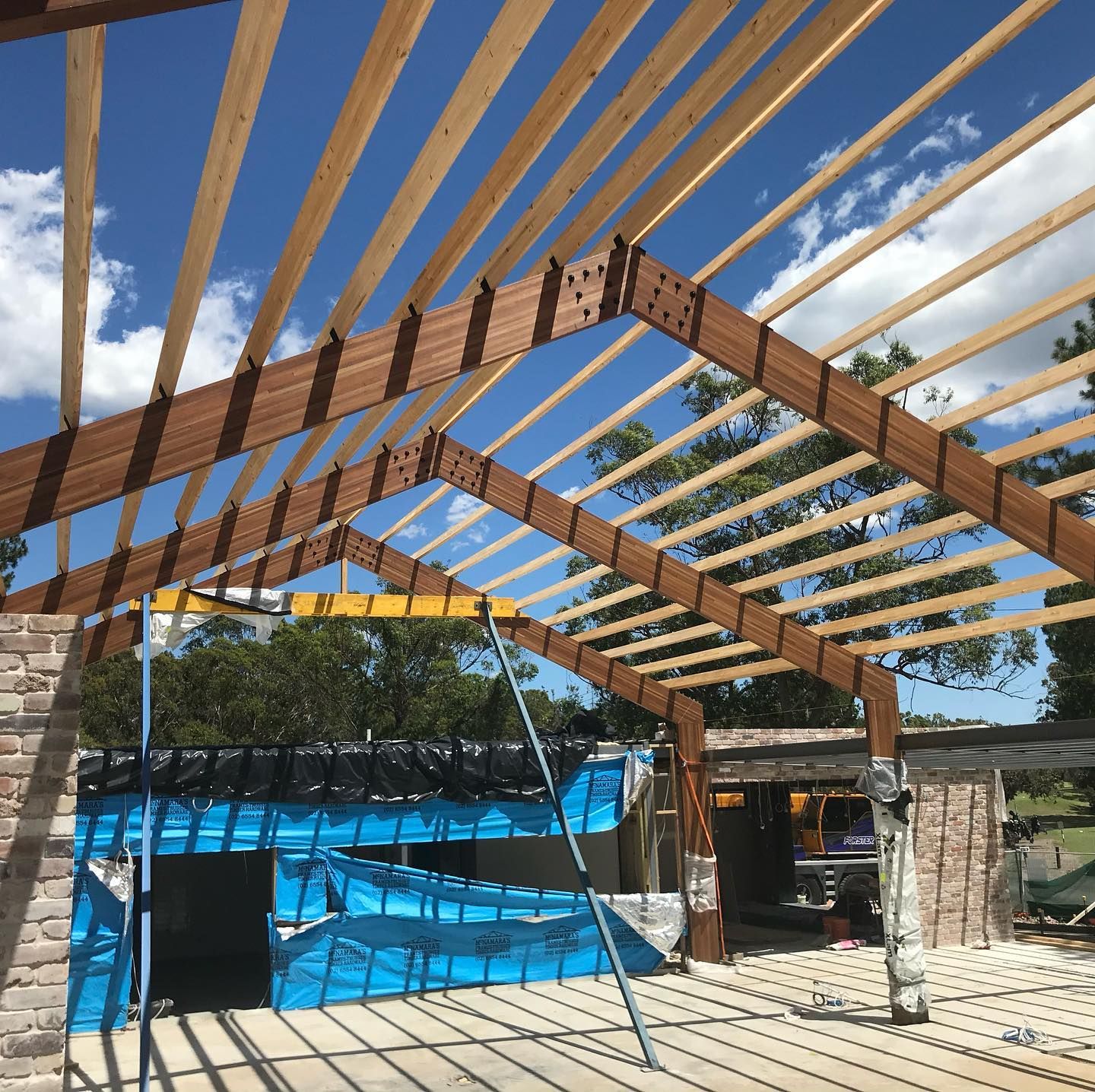 A Wooden Framework of A Building Under Construction — Coastline Building & Renovations In Smiths Lake, NSW