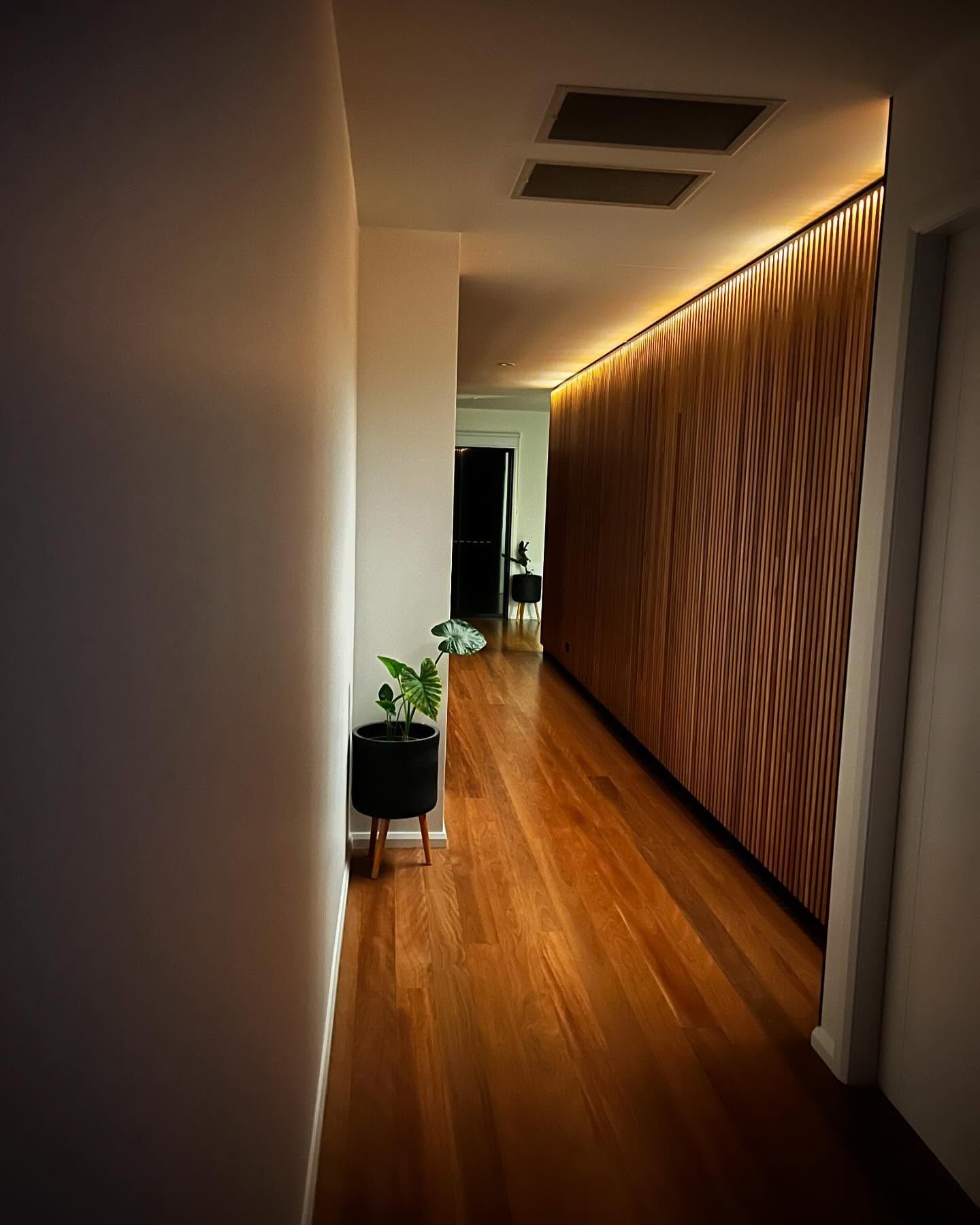 A Hallway with Wood Panel Wall — Coastline Building & Renovations In Forster, NSW