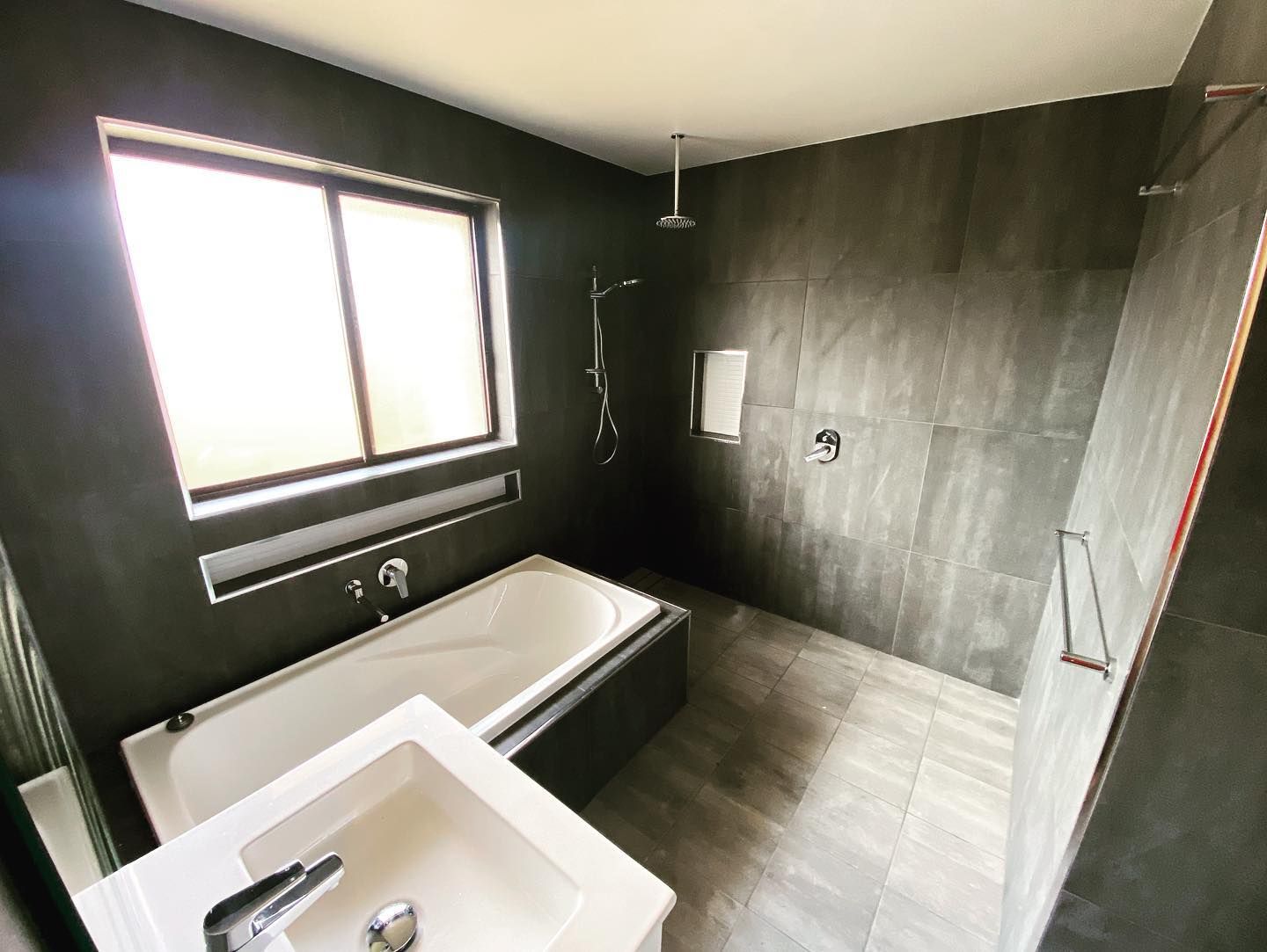 A Bathroom with A Tile Shower — Coastline Building & Renovations In Forster, NSW