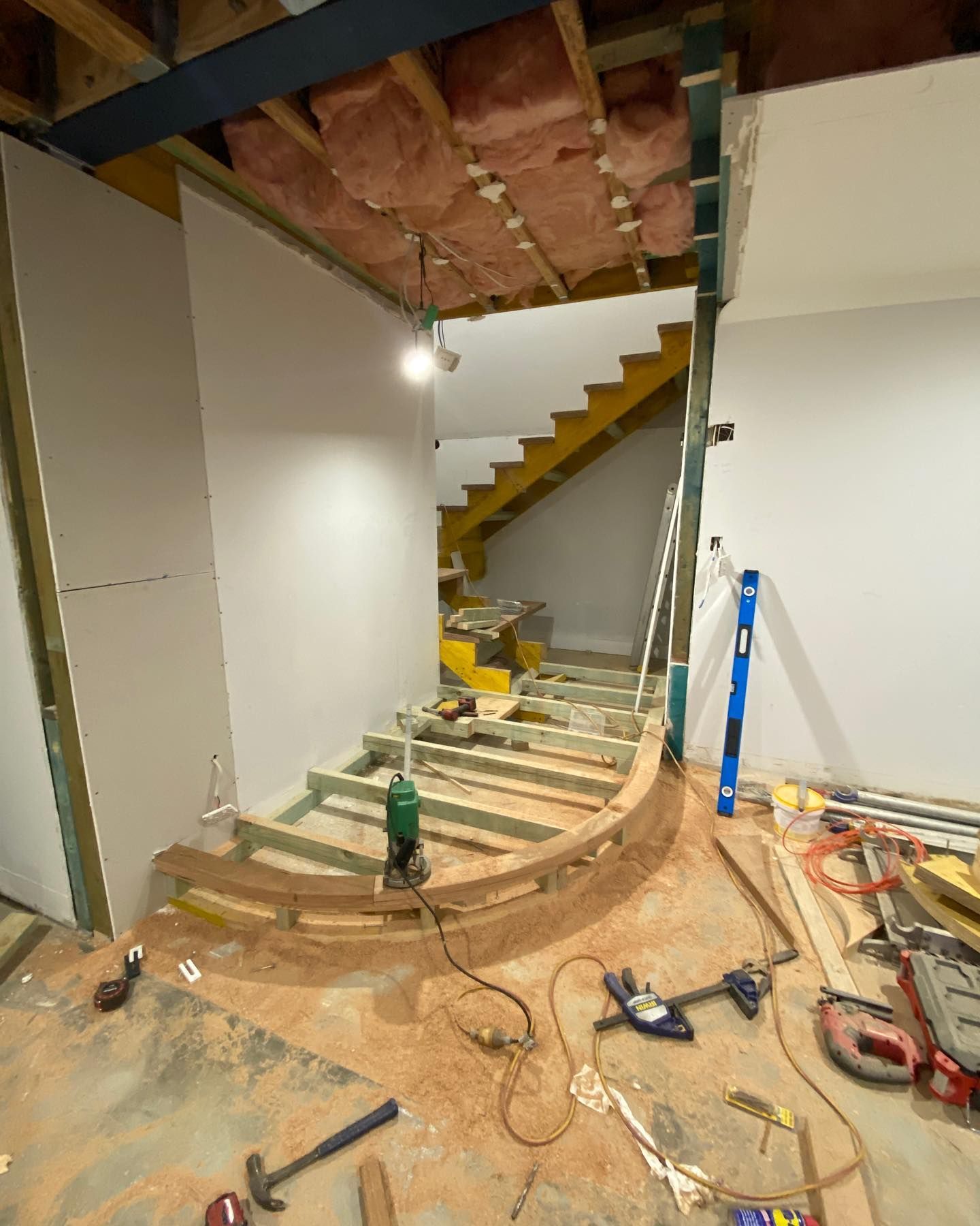 A Construction Site with Curved Staircase — Coastline Building & Renovations In Forster, NSW