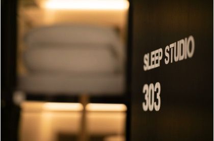 A close up of a sign that says sleep studio 303.