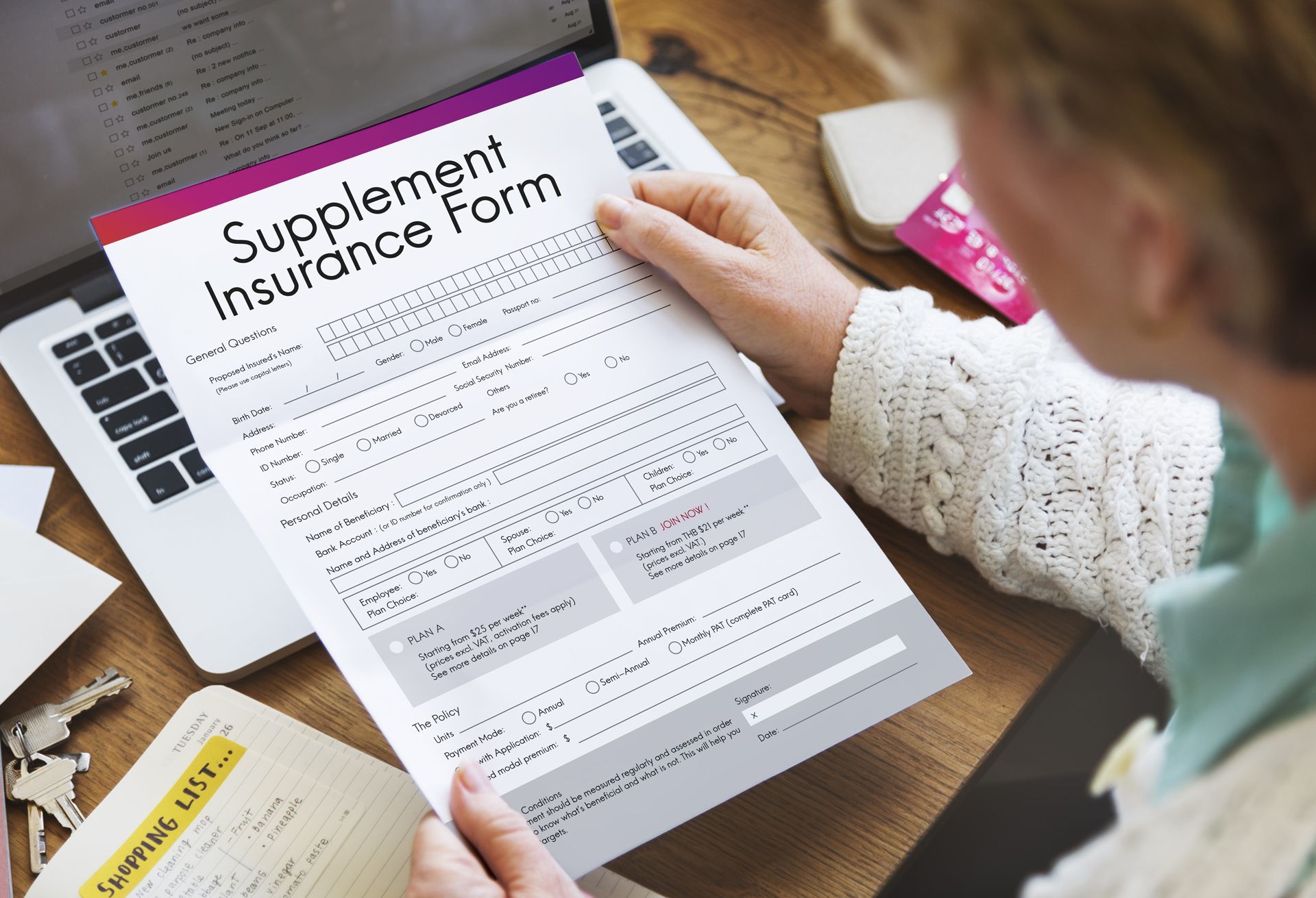 Woman is Holding a Supplement Insurance Form