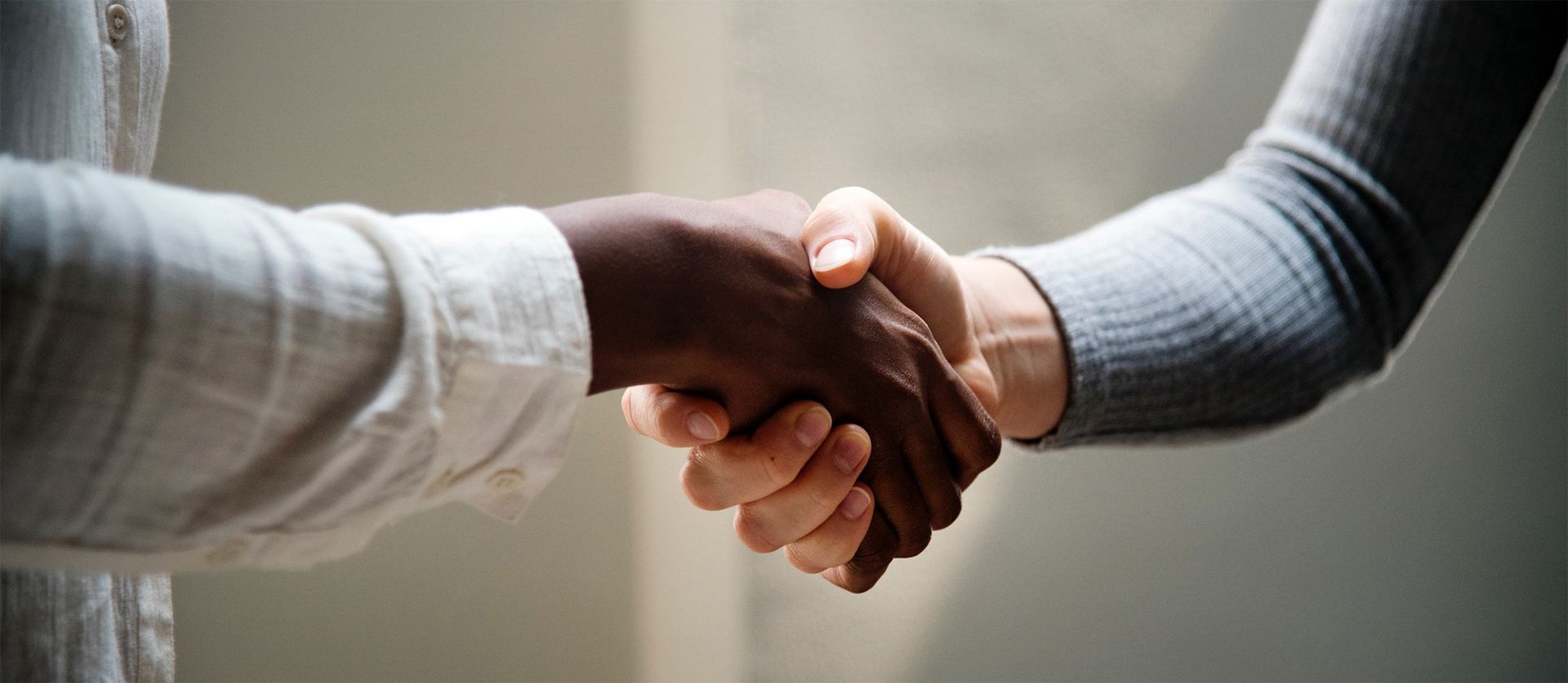 Insurance Agent and Client Shaking Hands